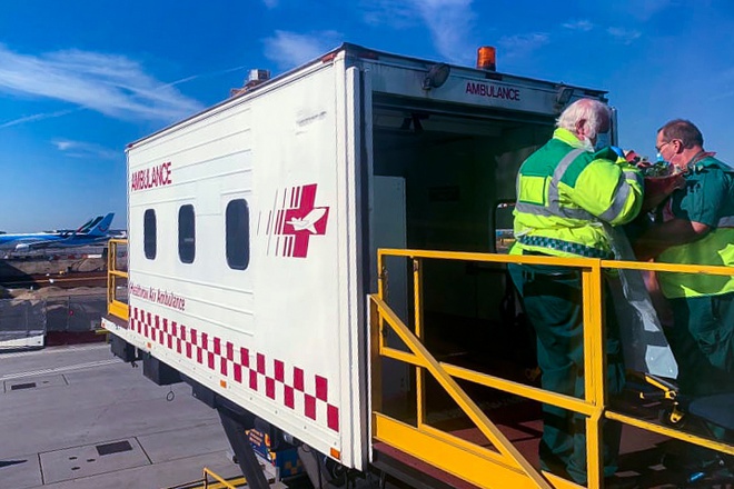 He was transfered to a dedicated ambulance after leaving the airplane